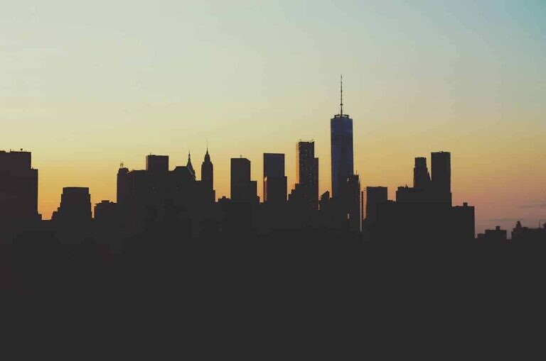 silhouette photography of high-rise buildings